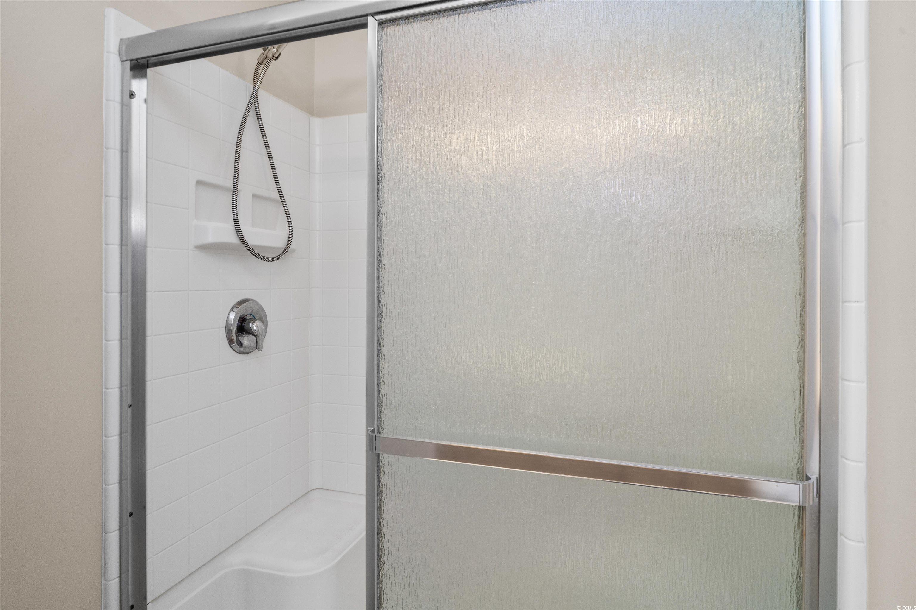 350 Kiskadee Loop, Unit B Conway, SC 29526 - Photo 17 of 40 Bathroom featuring a shower with shower door