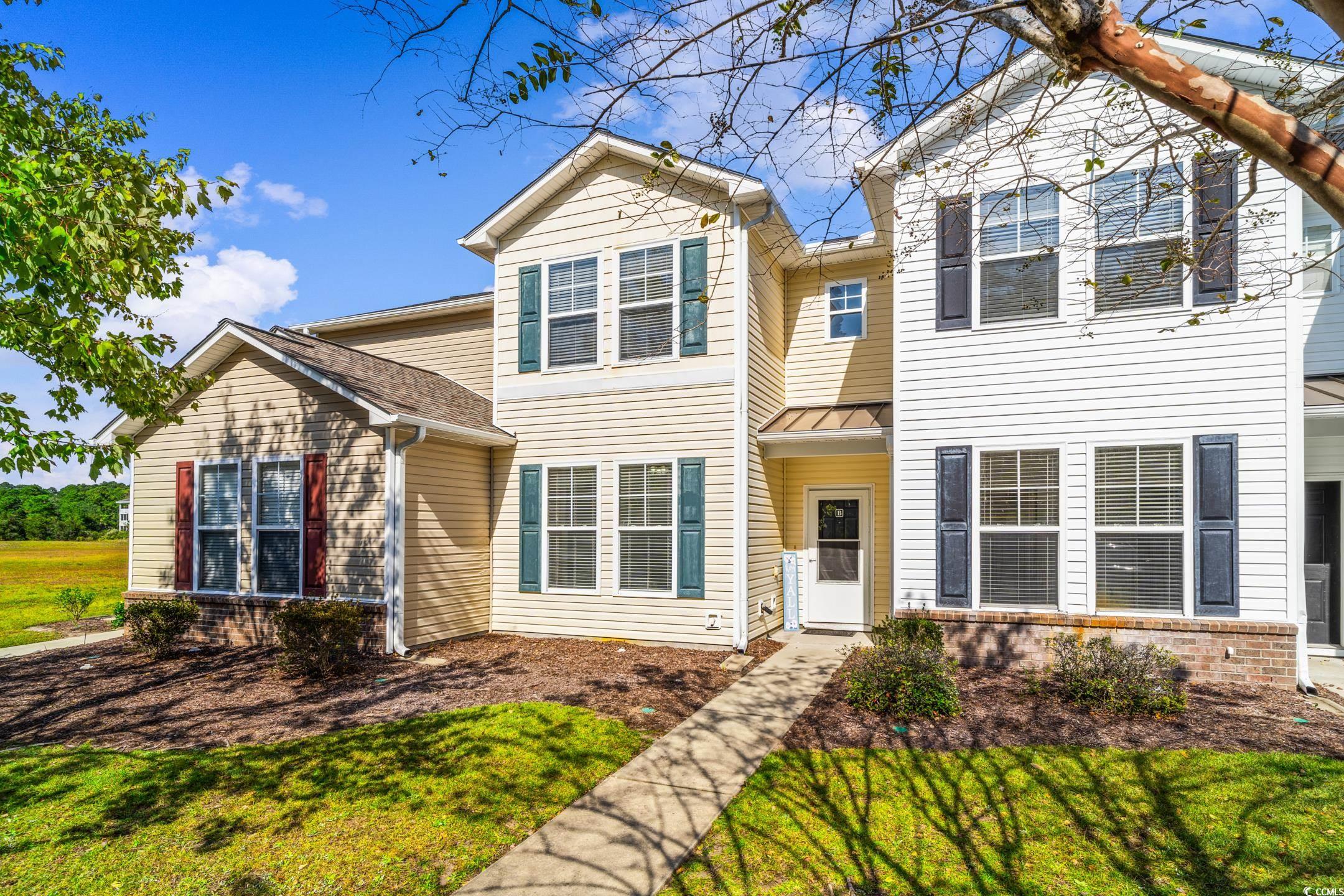 350 Kiskadee Loop, Unit B Conway, SC 29526 - Photo 2 of 40 View of front of home featuring a front yard