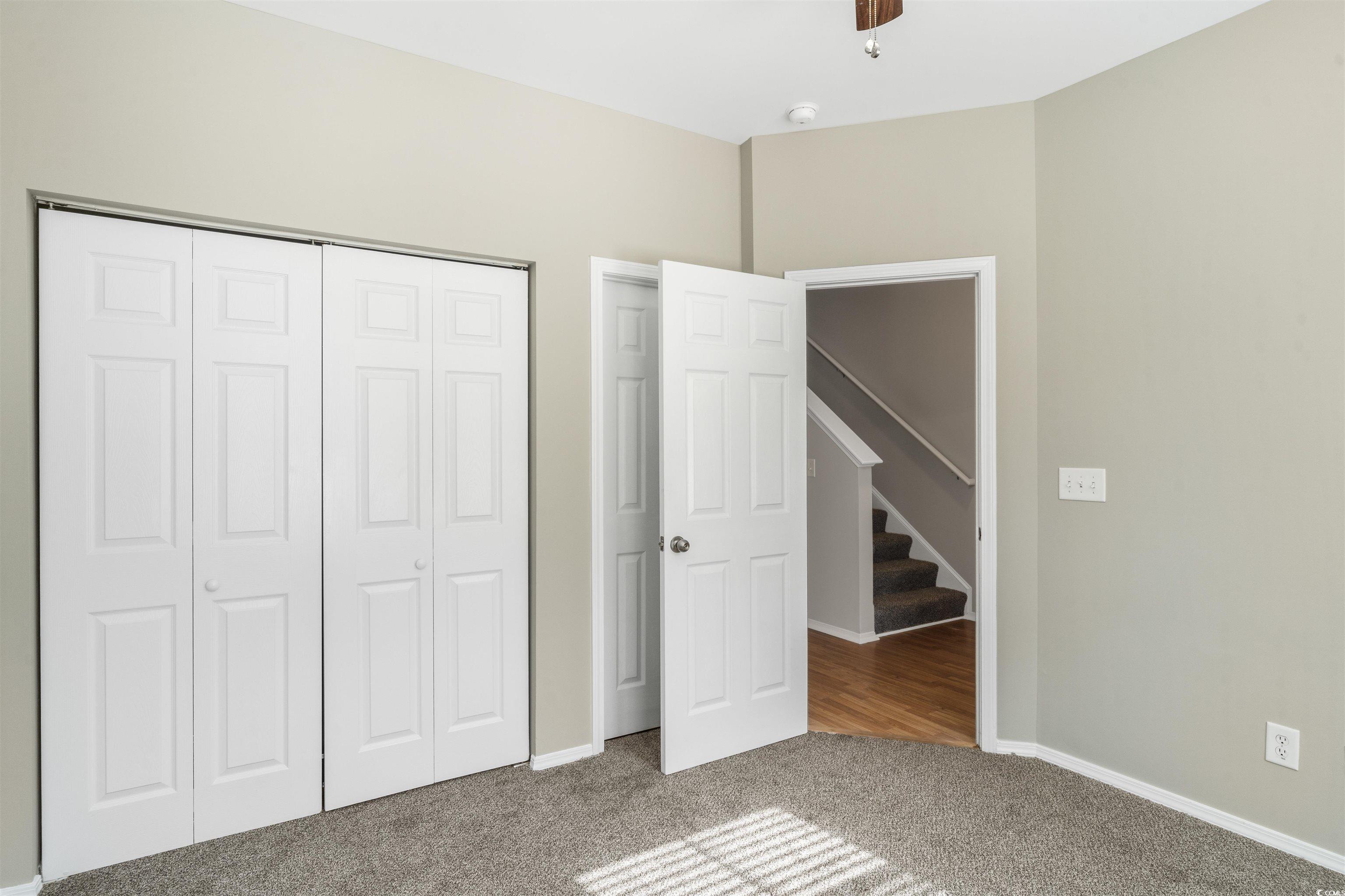 350 Kiskadee Loop, Unit B Conway, SC 29526 - Photo 22 of 40 Unfurnished bedroom with carpet floors