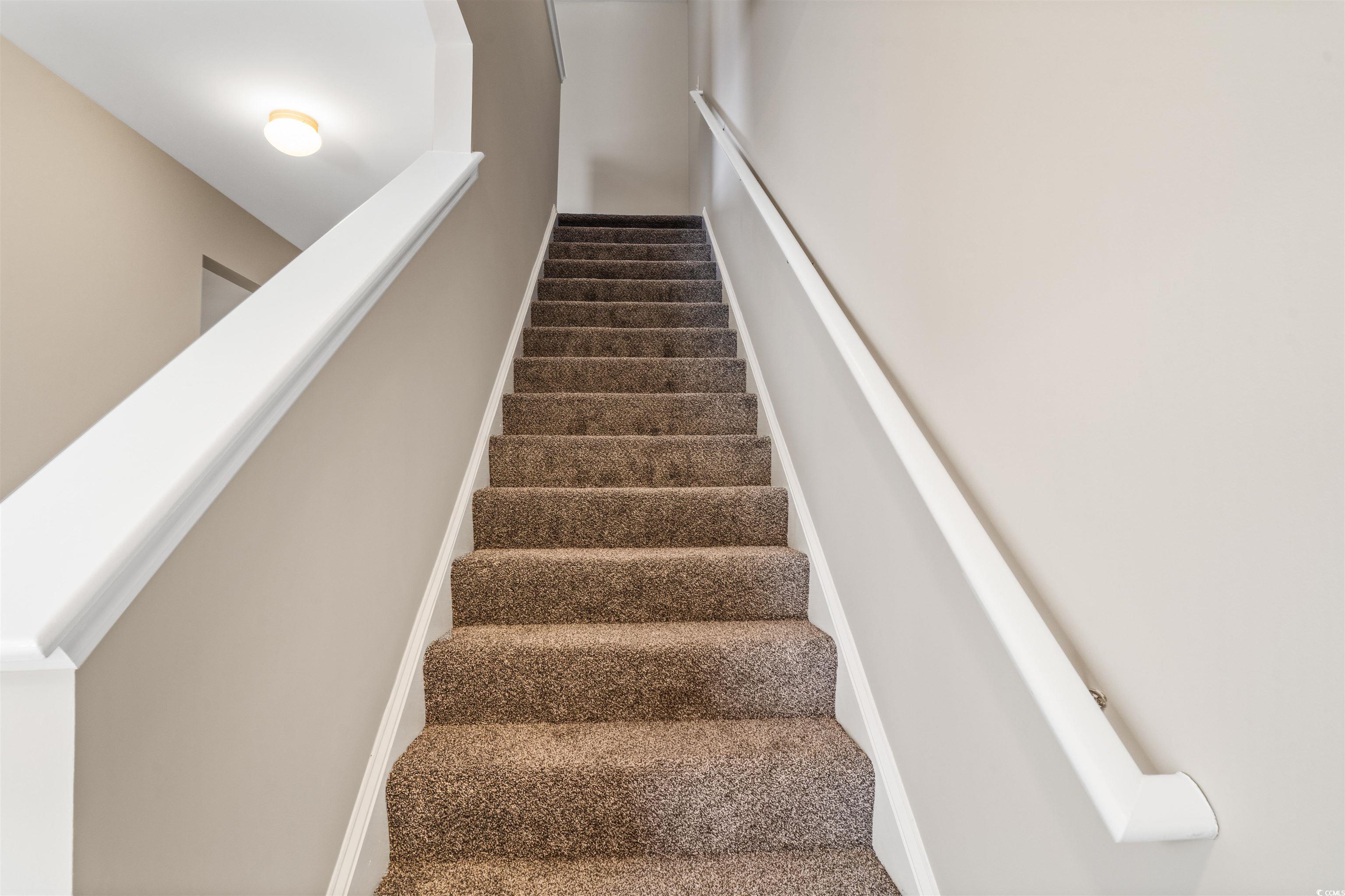 350 Kiskadee Loop, Unit B Conway, SC 29526 - Photo 25 of 40 Stairs featuring carpet flooring