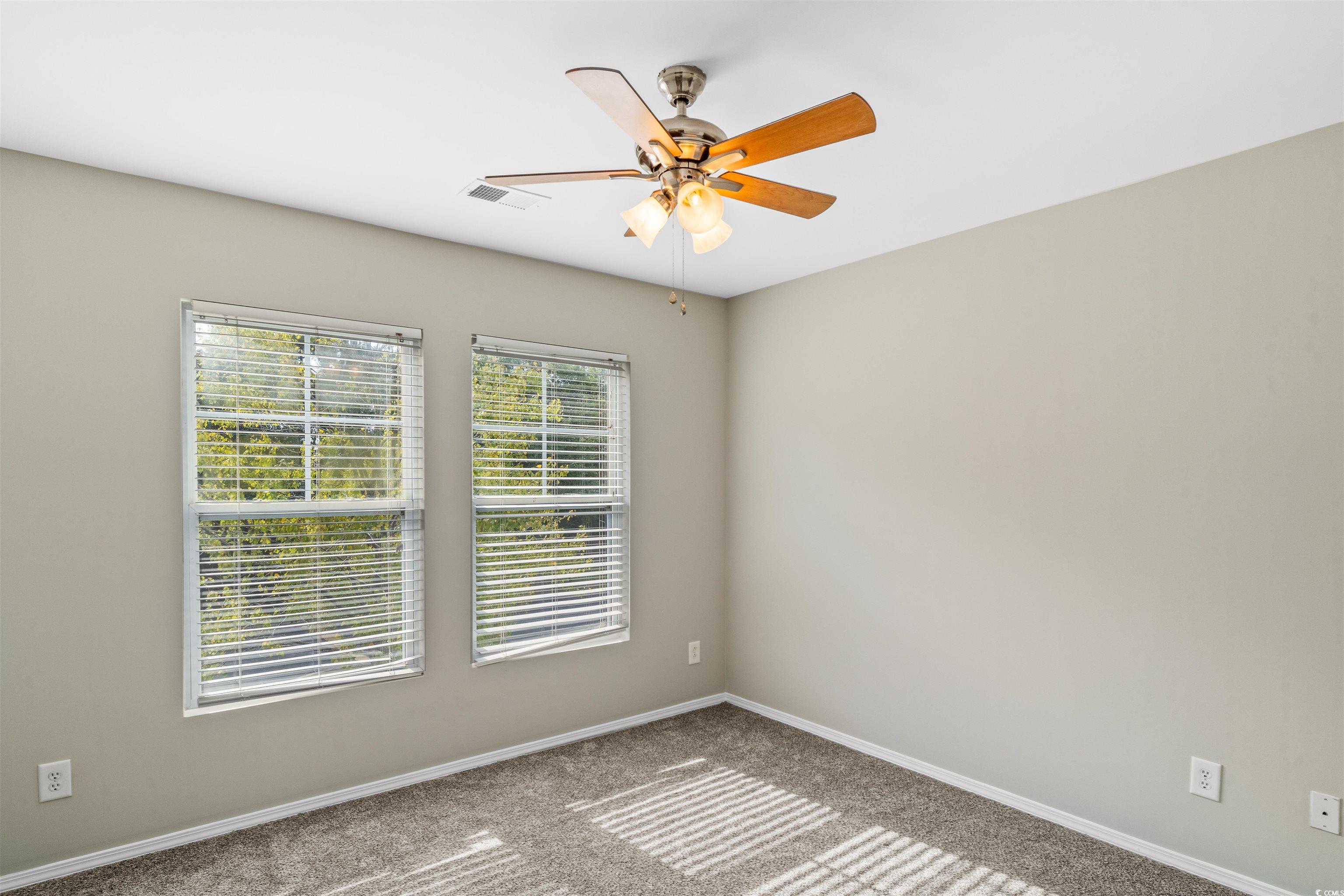 350 Kiskadee Loop, Unit B Conway, SC 29526 - Photo 27 of 40 Spare room featuring ceiling fan and light colored