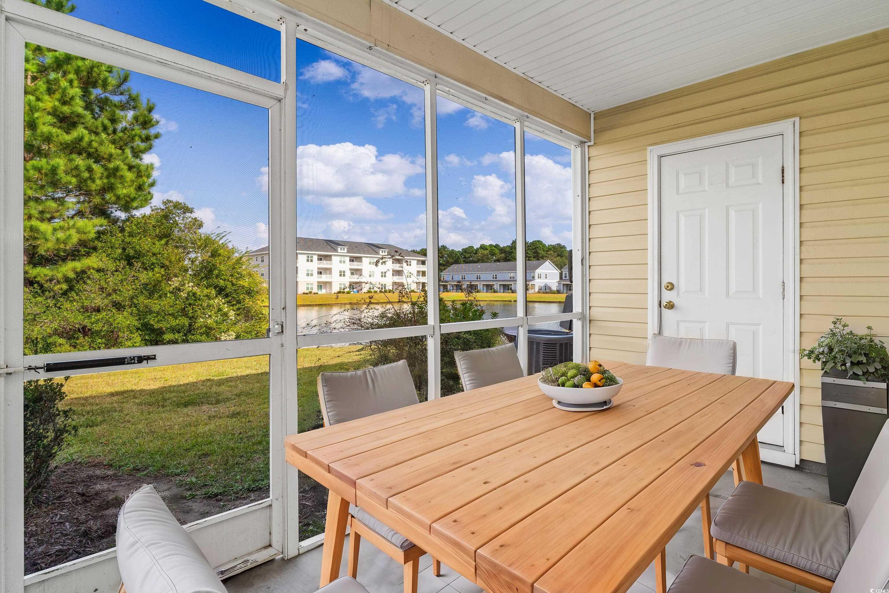 350 Kiskadee Loop, Unit B Conway, SC 29526 - Photo 30 of 40 Sunroom featuring a water view