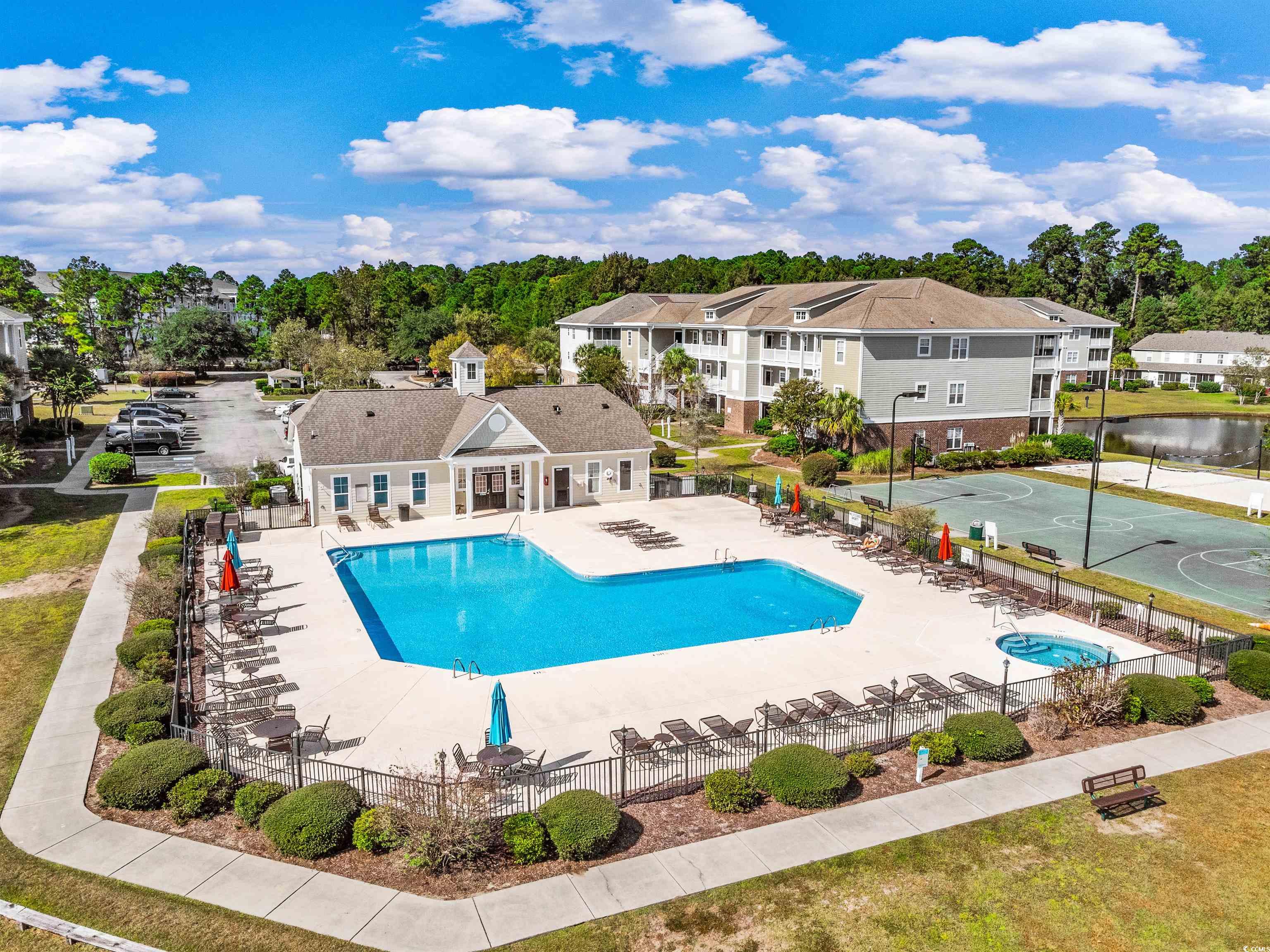 350 Kiskadee Loop, Unit B Conway, SC 29526 - Photo 36 of 40 View of pool with a water view, basketball hoop, a