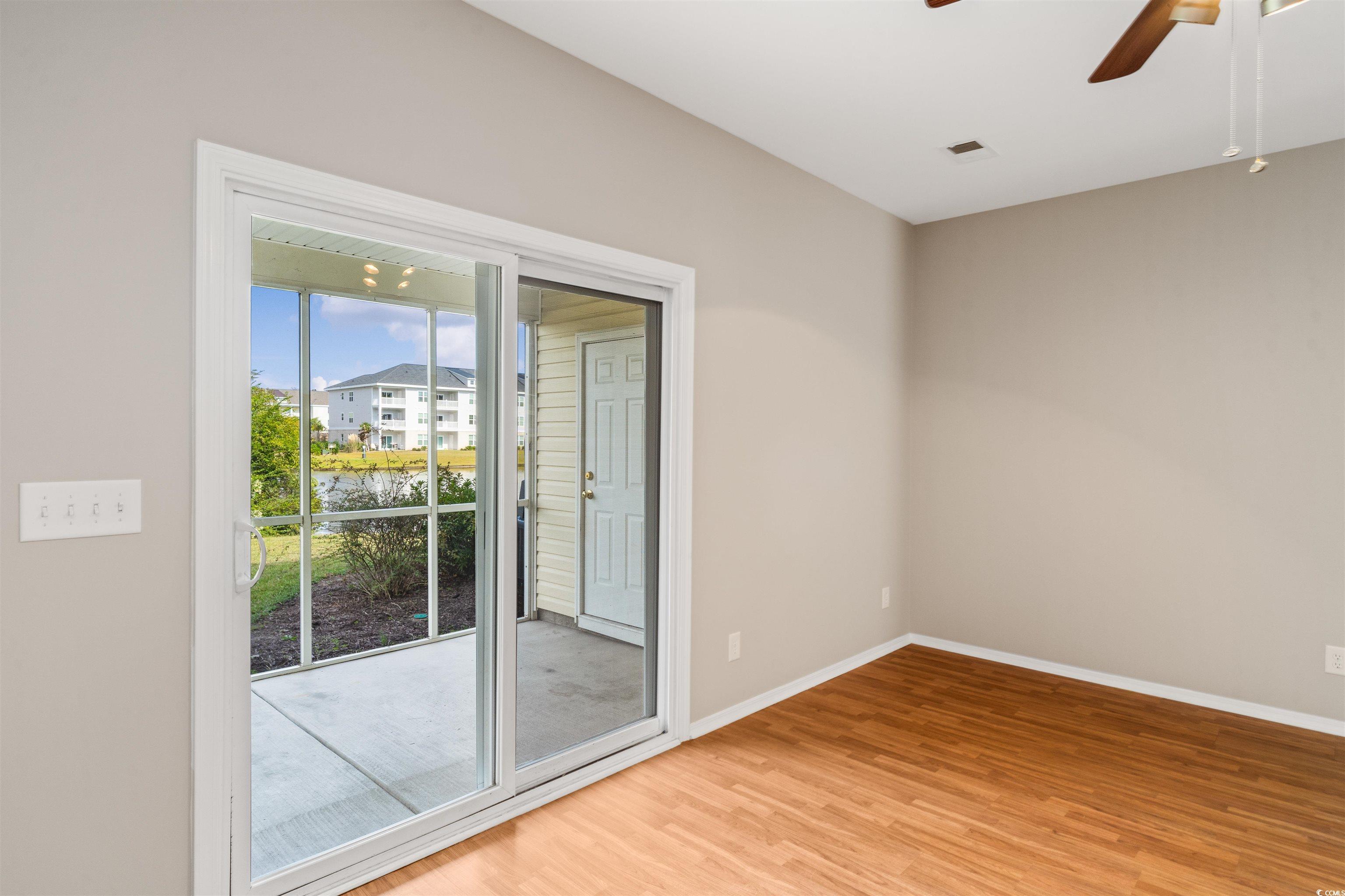 350 Kiskadee Loop, Unit B Conway, SC 29526 - Photo 6 of 40 Unfurnished room featuring hardwood / wood-style f