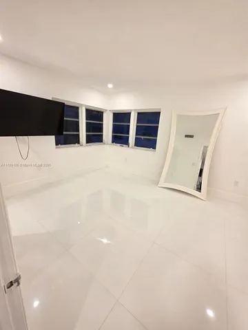 a view of a livingroom with a staircase