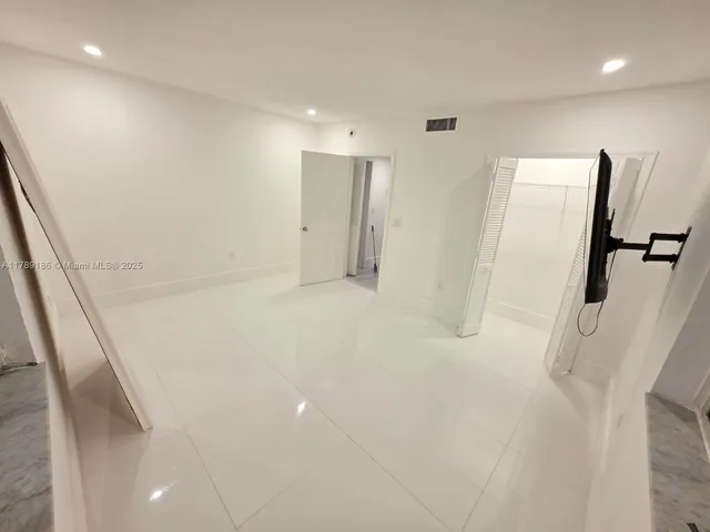 a view of a livingroom with a flat screen tv