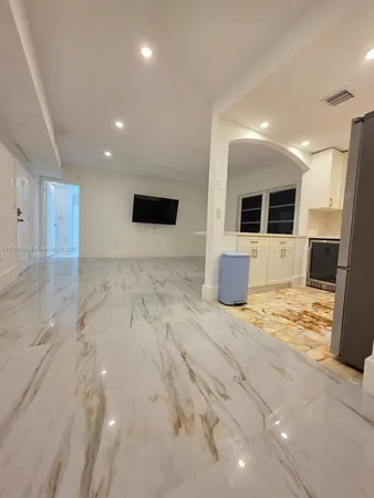 a view of a livingroom with a flat screen tv