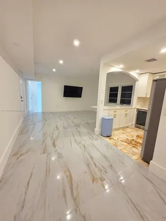 a view of a livingroom with a flat screen tv