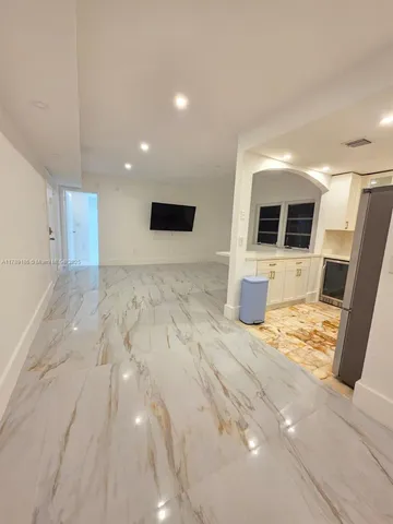 a view of a livingroom with a flat screen tv