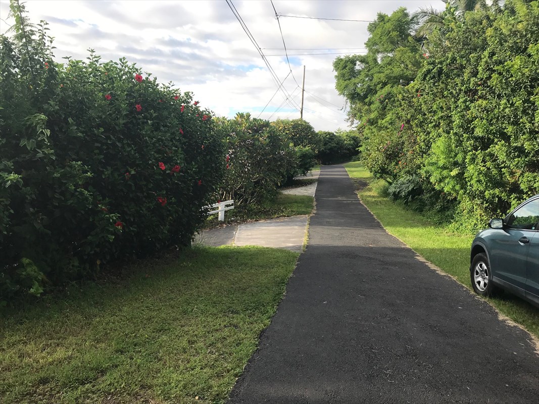 90 Datura Road Captain Cook, HI 96704 - Photo 6 of 15 a view of a pathway with a yard