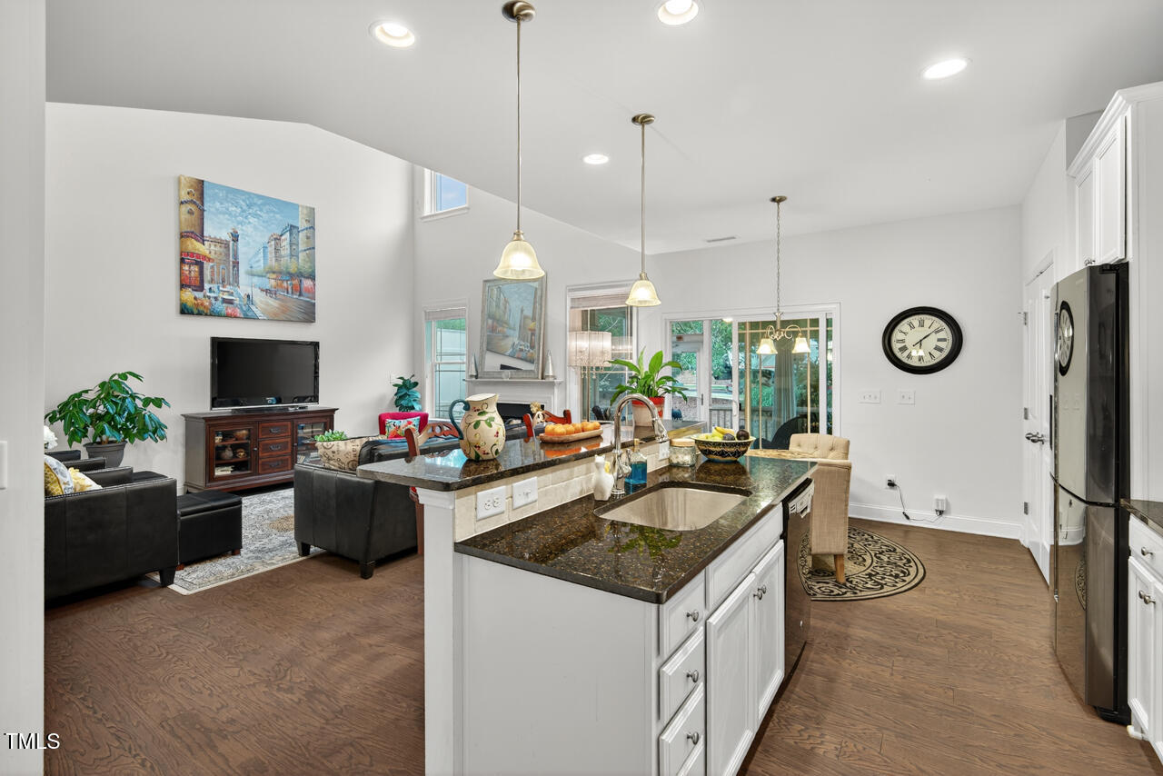 127 Willow View Lane Apex, NC 27539 - Photo 14 of 39 a kitchen that has a lot of cabinets