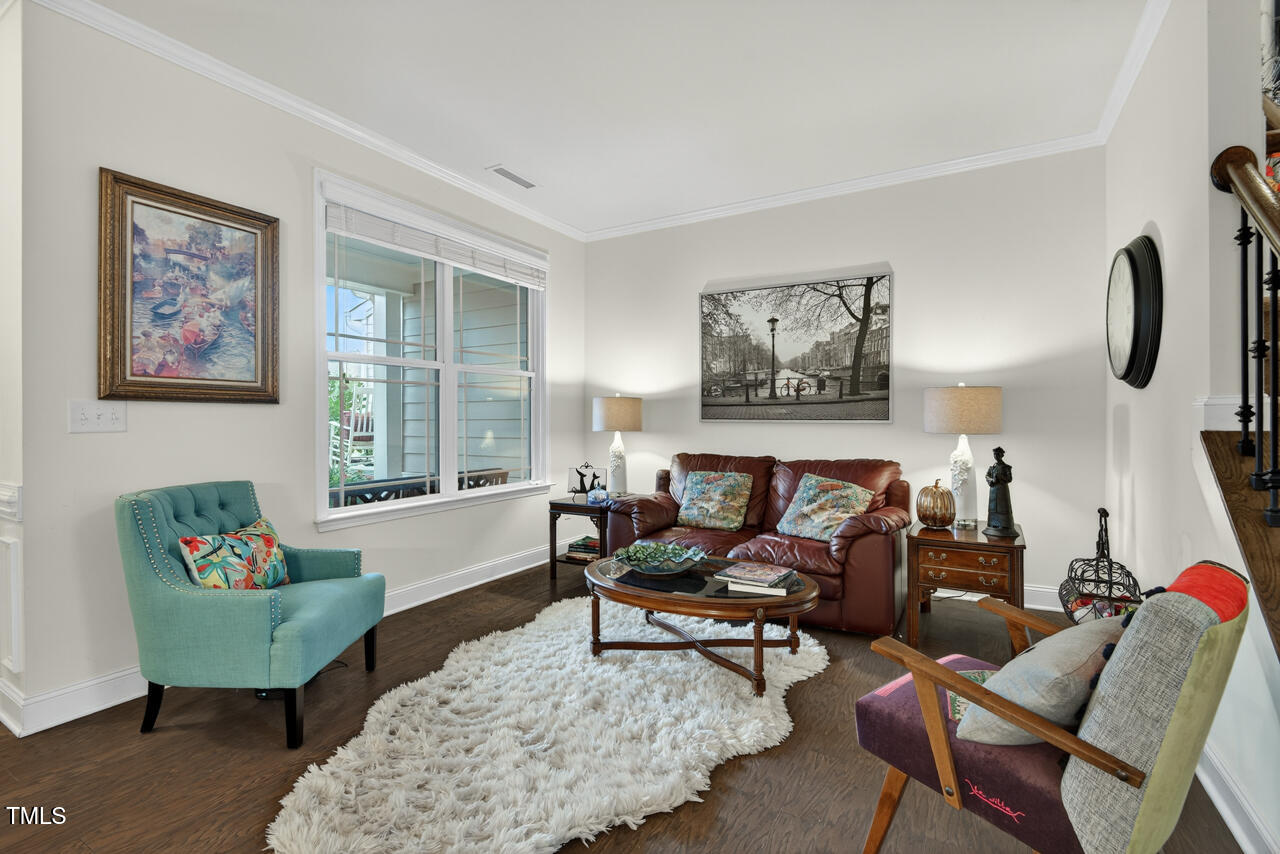 127 Willow View Lane Apex, NC 27539 - Photo 5 of 39 a living room with furniture and a window
