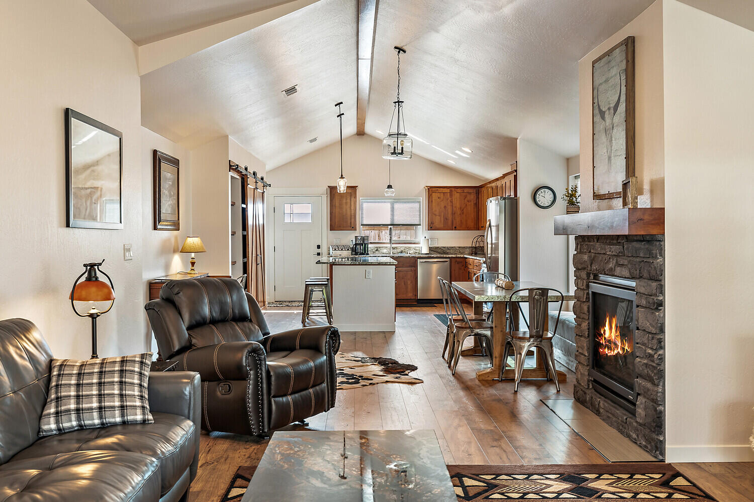 205 Suncrest Road Talent, OR 97540 - Photo 5 of 32 a living room with furniture and a chandelier