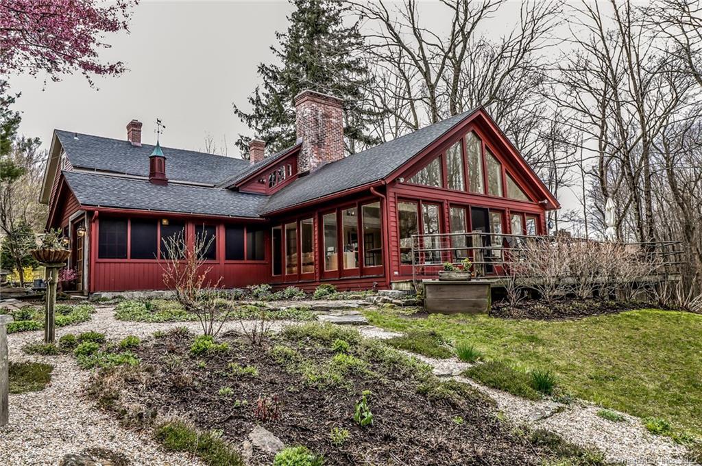 290 Lake Road Warren, CT 06777 - Photo 1 of 1 a front view of a house with a yard