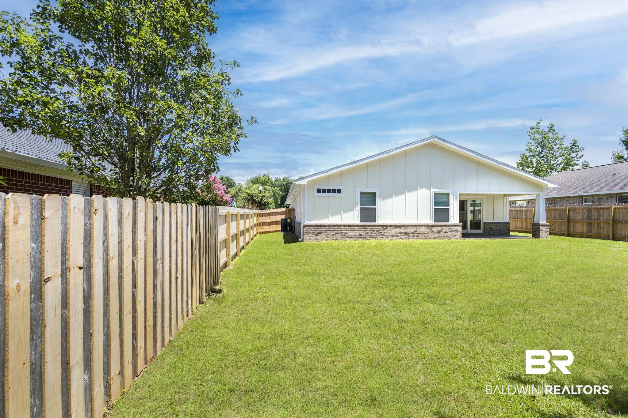 17126 Sugar Loop Foley, AL 36535 - Photo 22 of 28 View of fenced backyard