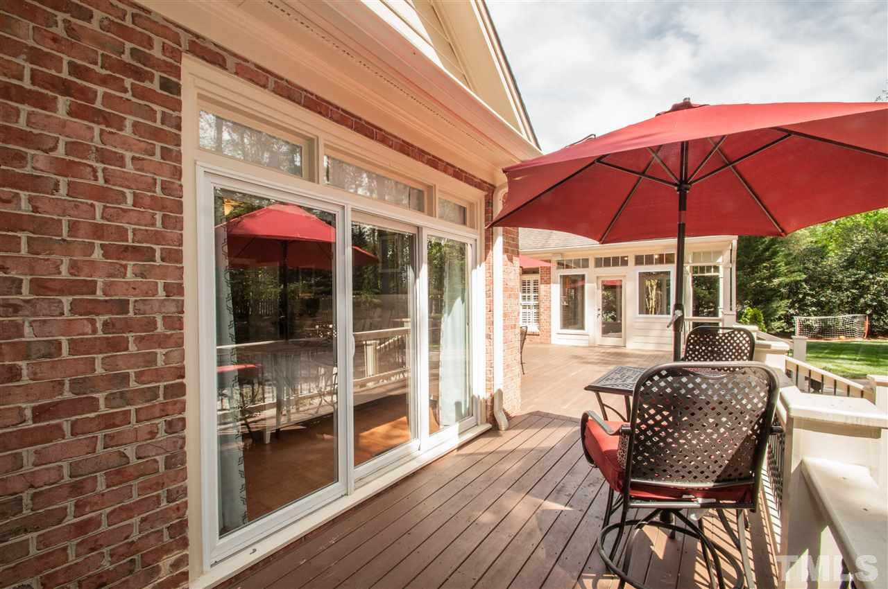 408 Chatterson Drive Raleigh, NC 27615 - Photo 22 of 25 a view of a house with sitting area and furniture