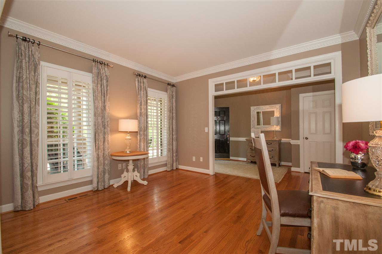 408 Chatterson Drive Raleigh, NC 27615 - Photo 10 of 25 a view of a livingroom with furniture and wooden floor