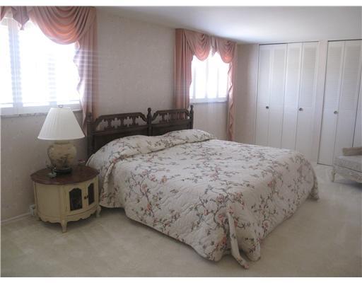 161 William Circle McKees Rocks, PA 15136 - Photo 6 of 12 Master Bedroom. The spacious master bedroom boasts neutral carpeting and a wall of closets.