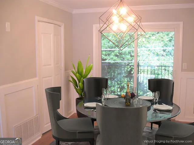 a view of a dining room with furniture window and outside view