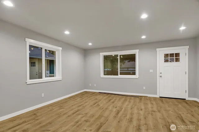 a kitchen with stainless steel appliances granite countertop a sink and a granite counter tops