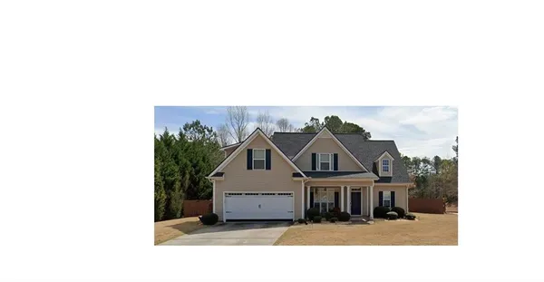 a house view with a garden