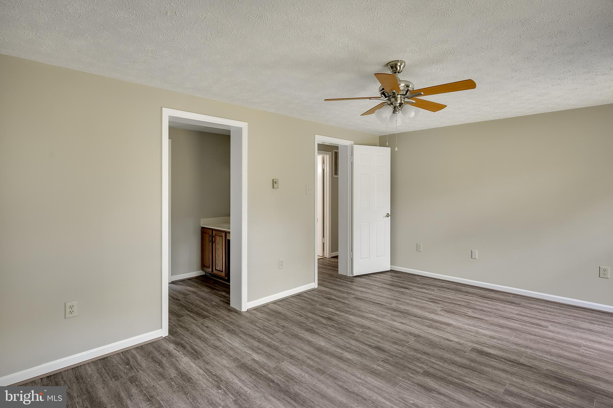 1504 New Hope Road Cross Junction, VA 22625 - Photo 11 of 35 wooden floor in an empty room with a window