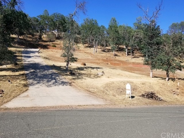 19415 Moon Ridge Road Hidden Valley Lake, CA 95467 - Photo 1 of 1 a view of a yard with snow on the road