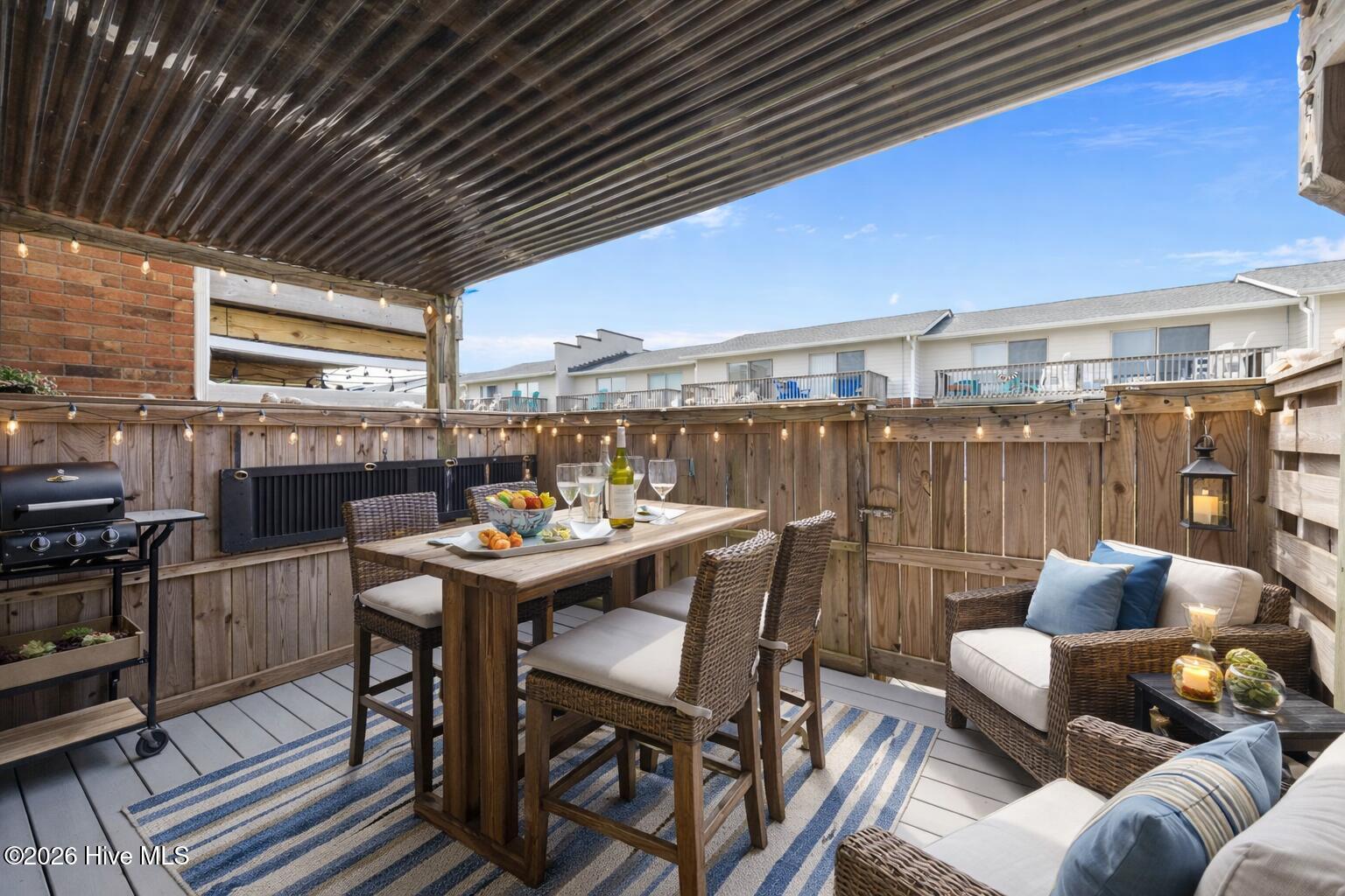 277 Salter Path Road, Unit 63 Pine Knoll Shores, NC 28512 - Photo 20 of 31 AI Staged Deck