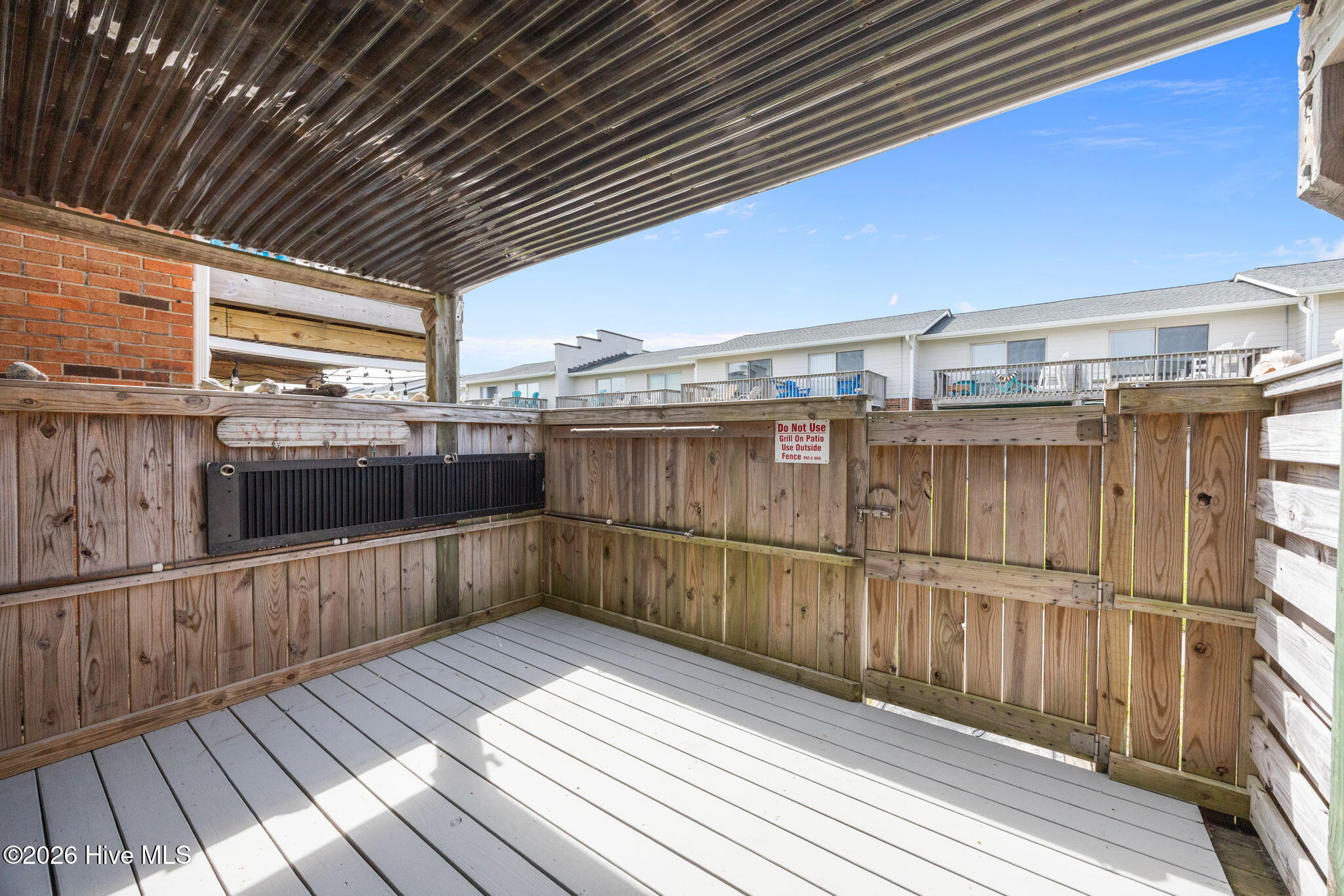 277 Salter Path Road, Unit 63 Pine Knoll Shores, NC 28512 - Photo 21 of 31 Lower Patio