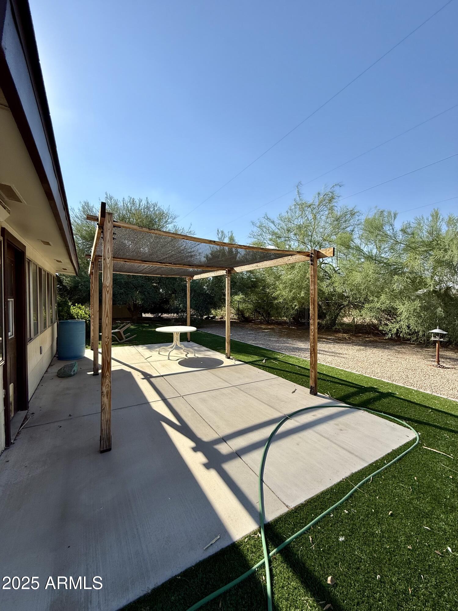 5856 Colby Street Mesa, AZ 85205 - Photo 17 of 18 a view of a backyard with swimming pool
