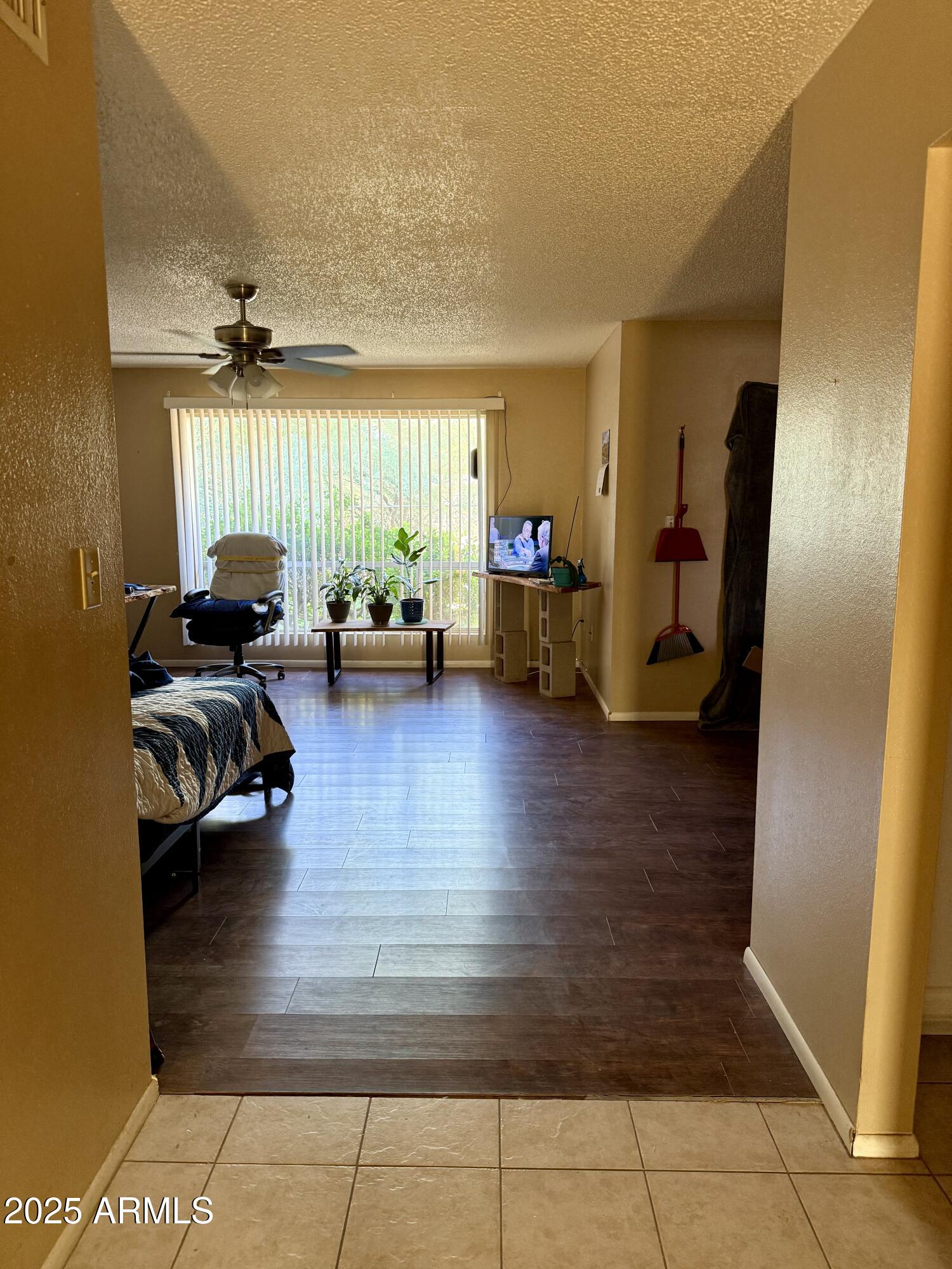 5856 Colby Street Mesa, AZ 85205 - Photo 5 of 18 a view of a livingroom with furniture and a window