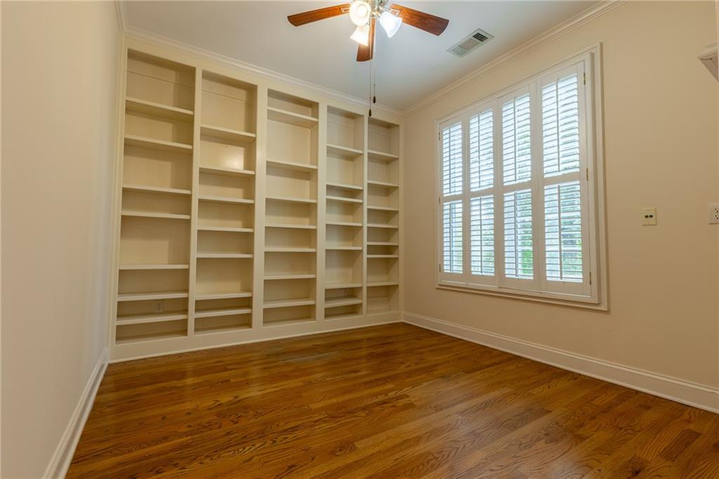 5739 Ridgewater Circle Gainesville, GA 30506 - Photo 19 of 93 a view of an empty room with a window and wooden floor