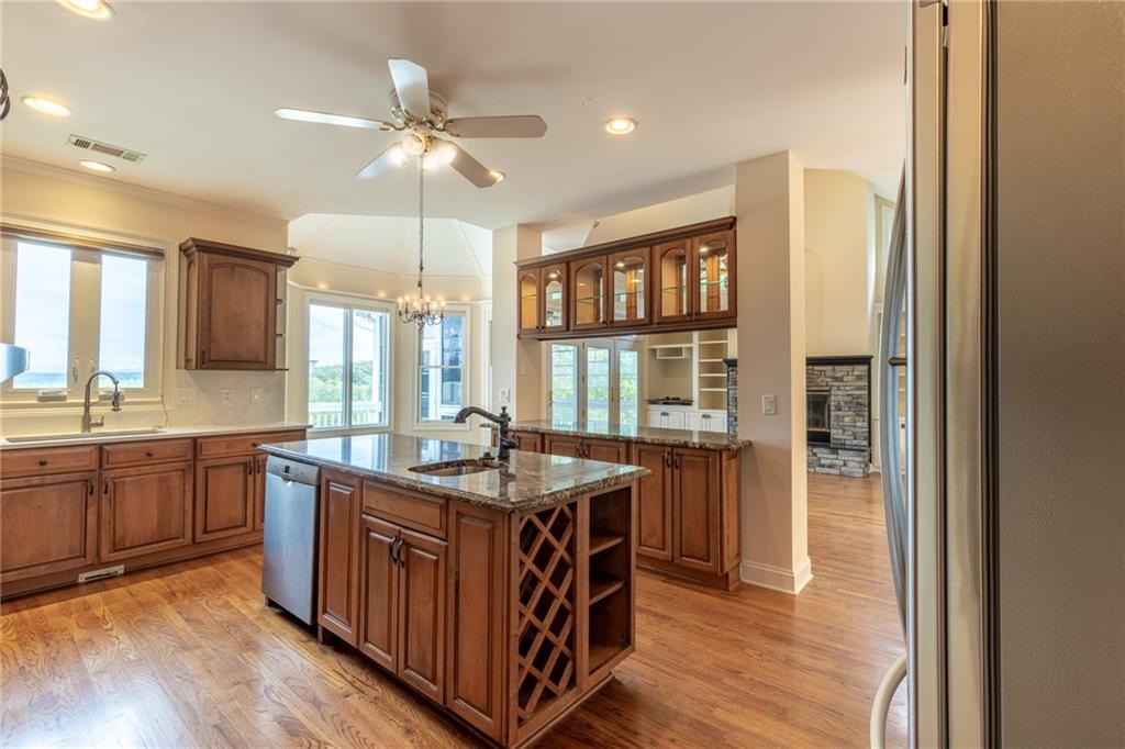 5739 Ridgewater Circle Gainesville, GA 30506 - Photo 34 of 93 a kitchen with a stove a sink and a refrigerator