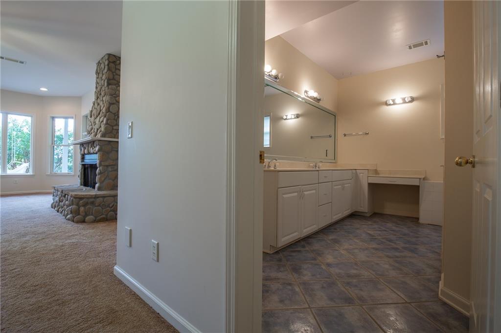 5739 Ridgewater Circle Gainesville, GA 30506 - Photo 69 of 93 a view of a storage & utility room with two washing machine