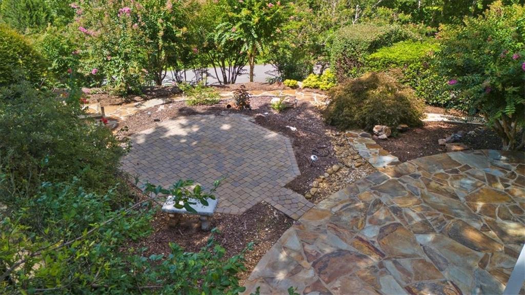 5739 Ridgewater Circle Gainesville, GA 30506 - Photo 82 of 93 a view of a yard with plants and large trees