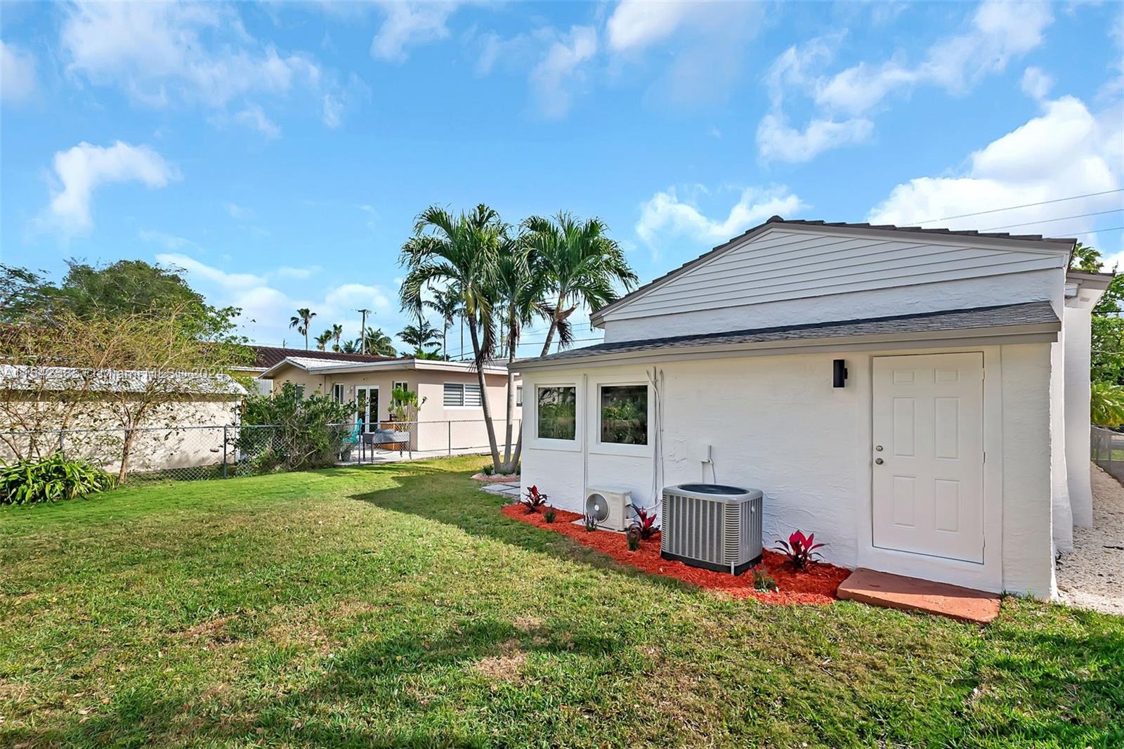 2521 Southwest 25th Terrace Miami, FL 33133 - Photo 20 of 26 a view of front of house with a yard