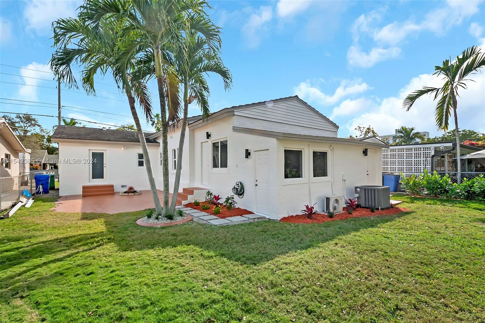 2521 Southwest 25th Terrace Miami, FL 33133 - Photo 21 of 26 a front view of house with yard having seating space