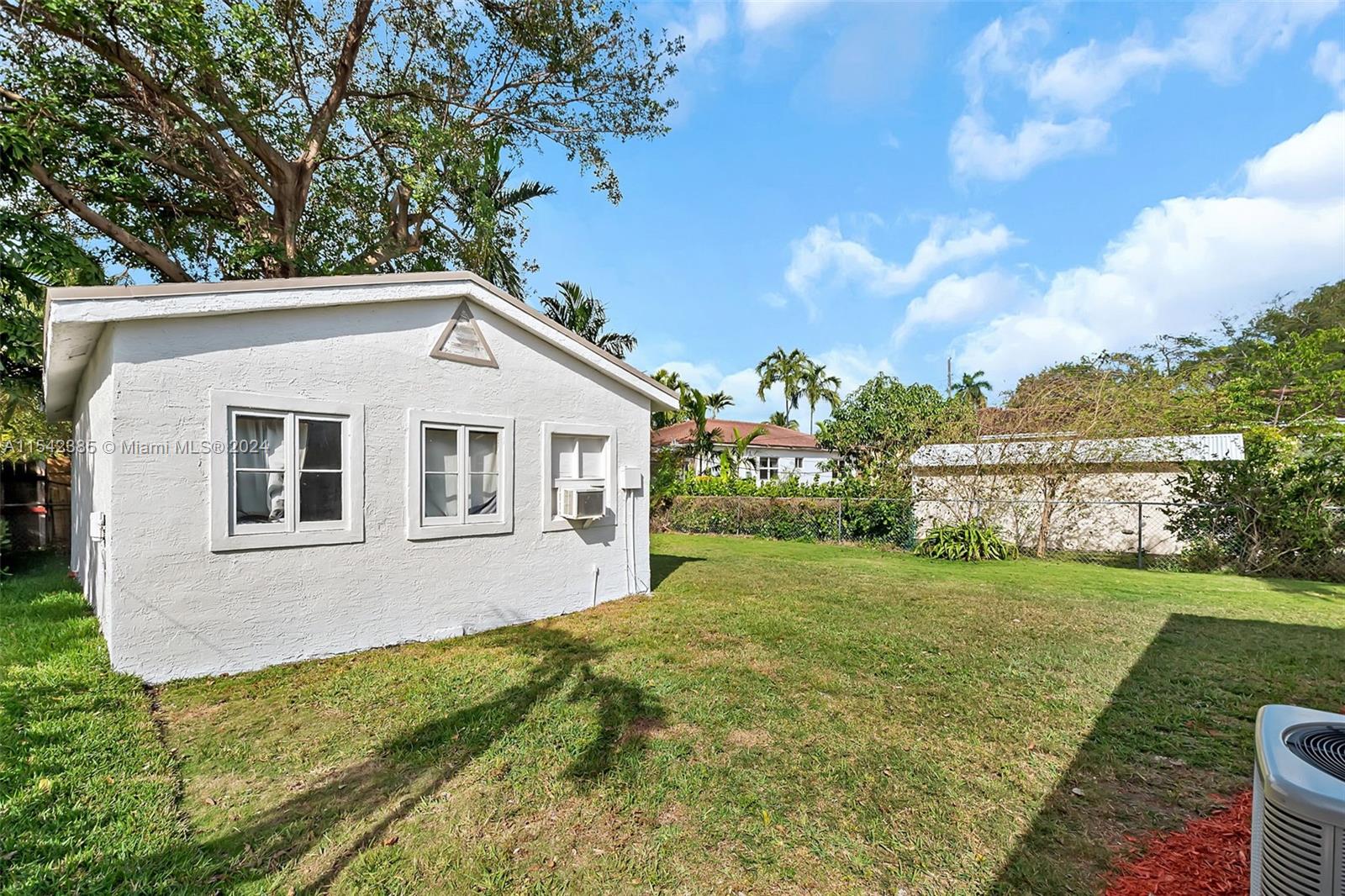 2521 Southwest 25th Terrace Miami, FL 33133 - Photo 23 of 26 a front view of a house with a yard