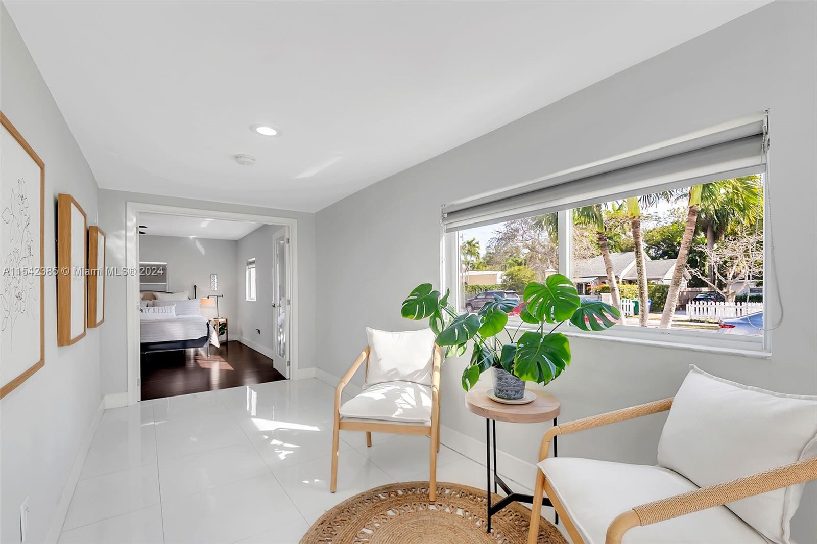 2521 Southwest 25th Terrace Miami, FL 33133 - Photo 24 of 26 a living room with furniture and a large window