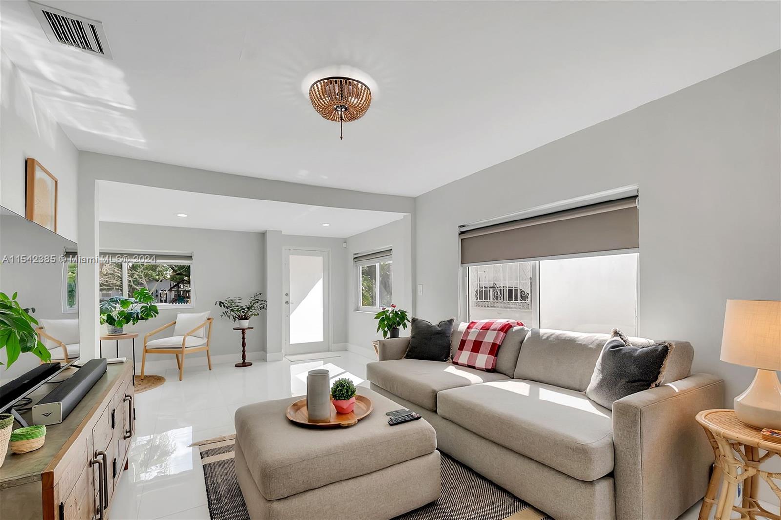 2521 Southwest 25th Terrace Miami, FL 33133 - Photo 26 of 26 a living room with furniture and a large window