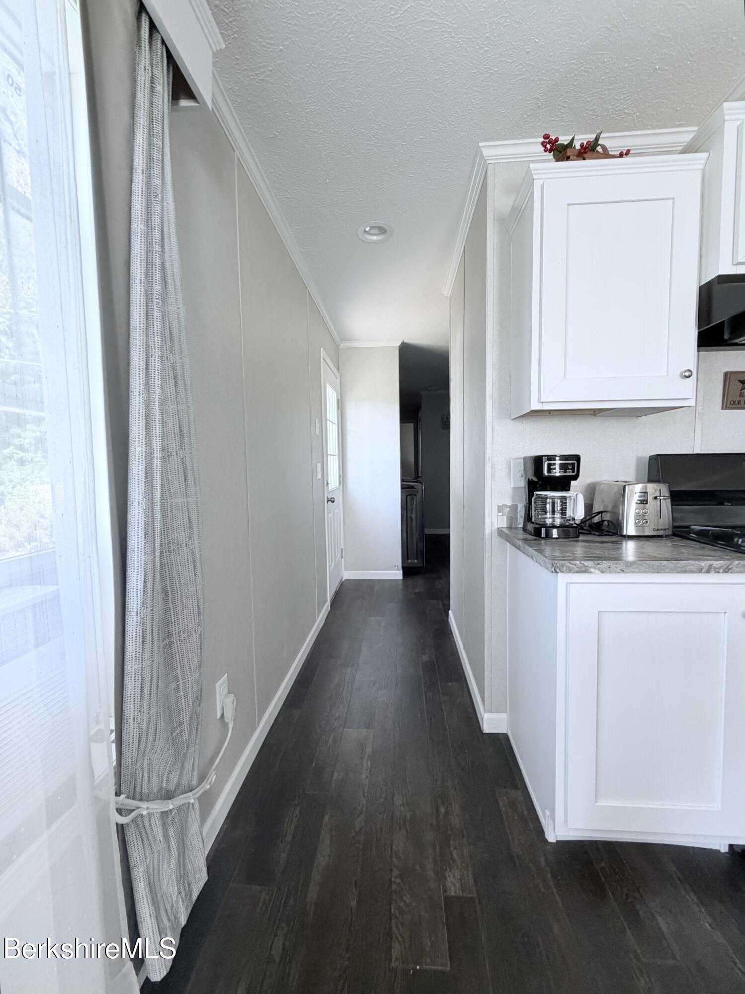 29 4th Avenue Cheshire, MA 01225 - Photo 8 of 13 a kitchen with sink and cabinets