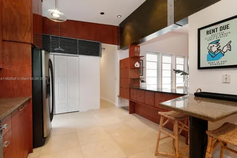 a view of kitchen and windows