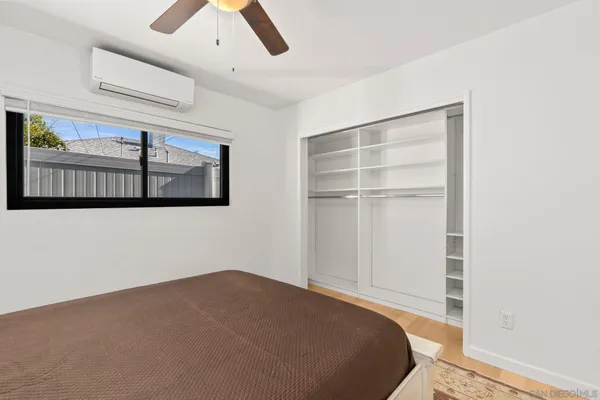 a kitchen with stainless steel appliances granite countertop a refrigerator a sink a stove and island