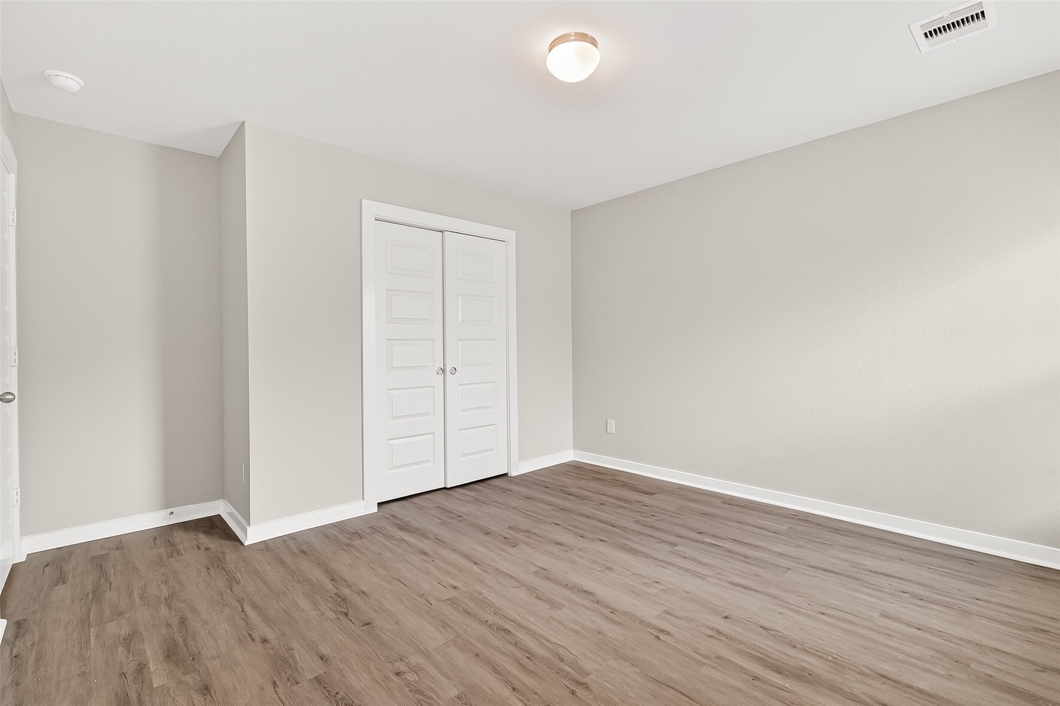 2142 Reed Cave Lane Spring, TX 77386 - Photo 38 of 50 a view of an empty room with wooden floor