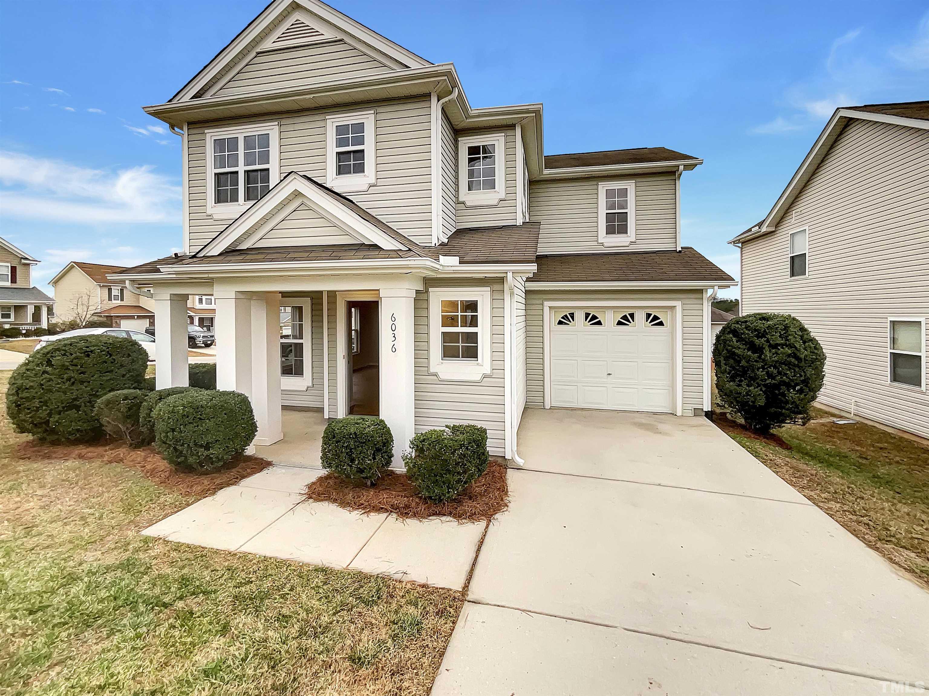 6036 Namozine Court Raleigh, NC 27610 - Photo 1 of 19 front view of a house with a yard