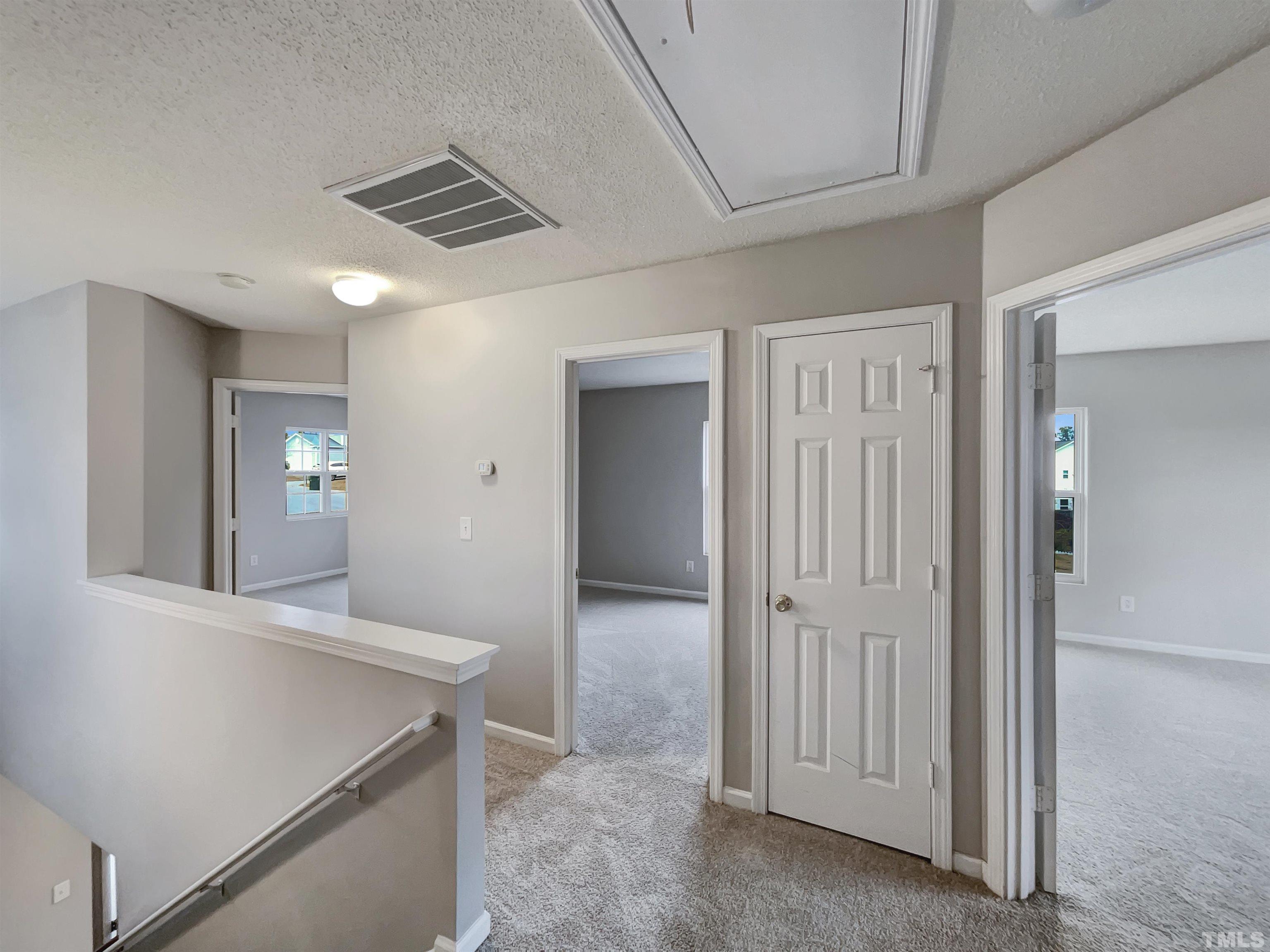 6036 Namozine Court Raleigh, NC 27610 - Photo 13 of 19 wooden floor in an empty room