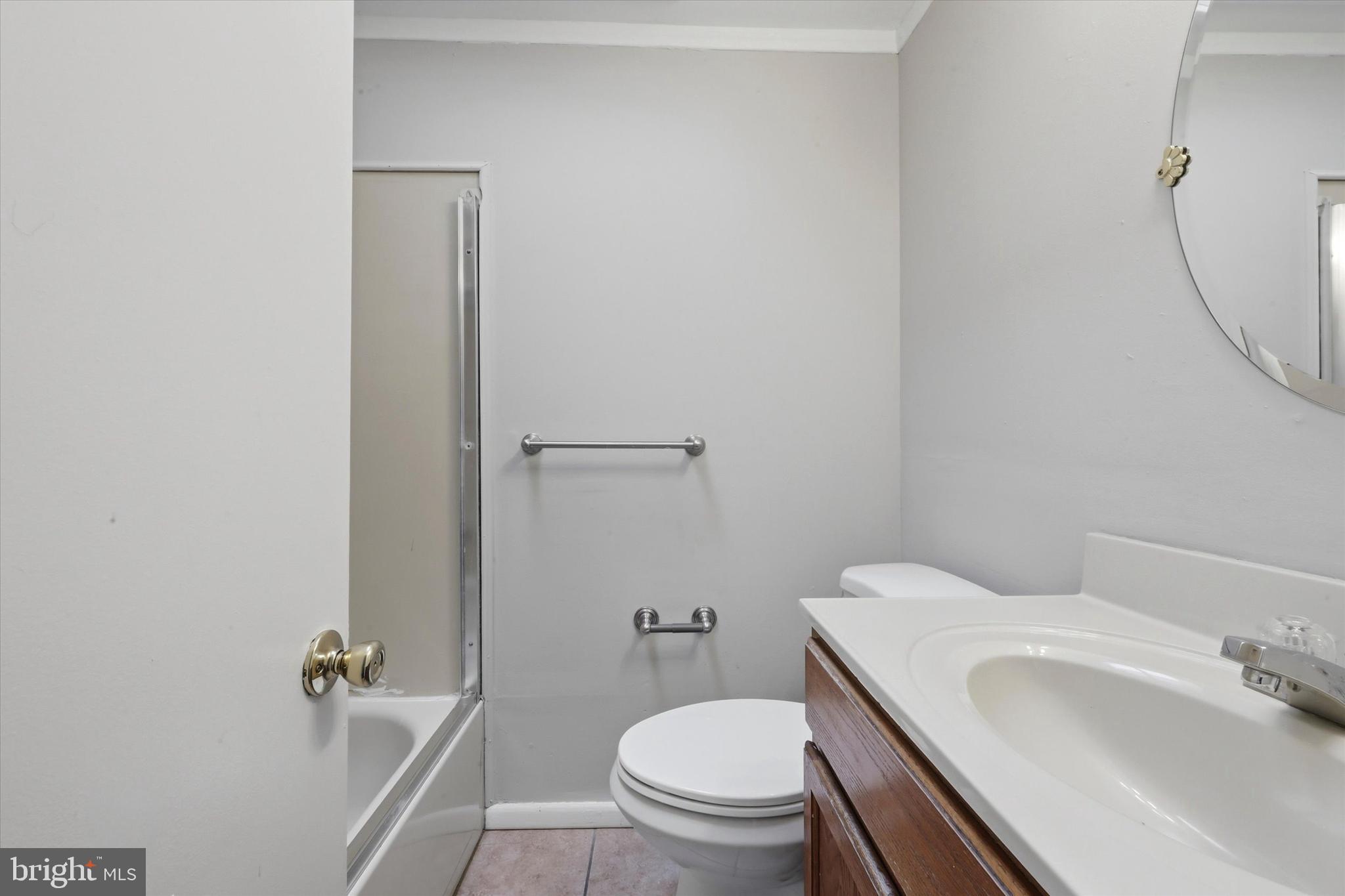 151 Chadwick Avenue Marcus Hook, PA 19061 - Photo 11 of 14 a bathroom with a sink and toilet
