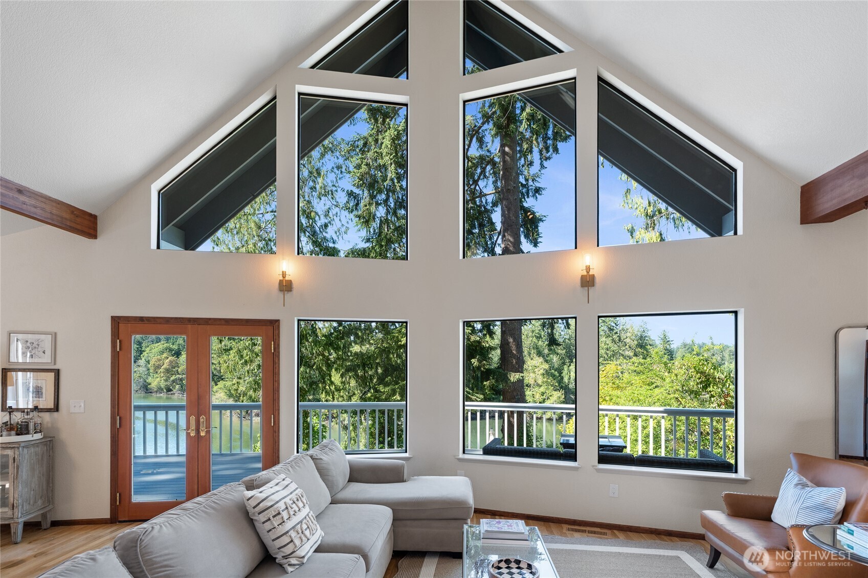 19709 Whiteman Cove Road Southwest Longbranch, WA 98351 - Photo 10 of 40 a living room with furniture and windows