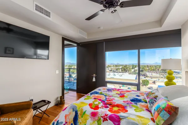 a bedroom that has a bed and a window