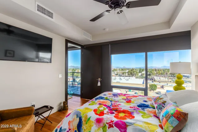 a bedroom that has a bed and a window